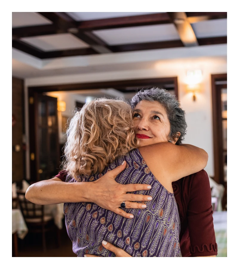 Friends sharing a heartfelt hug