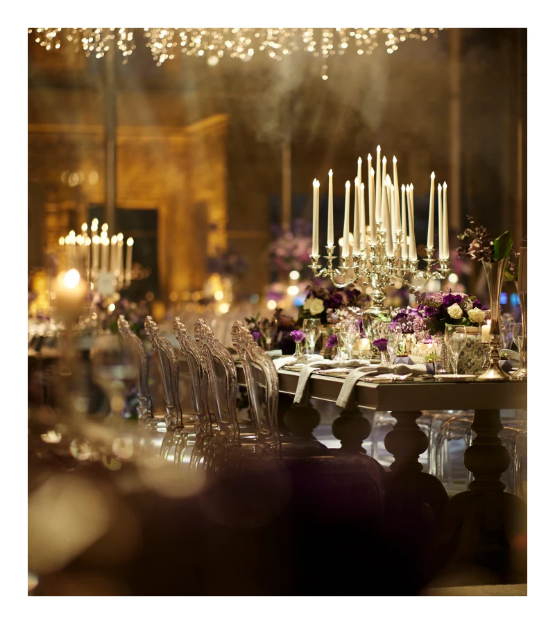 Elegant candlelit dinner setting with flowers